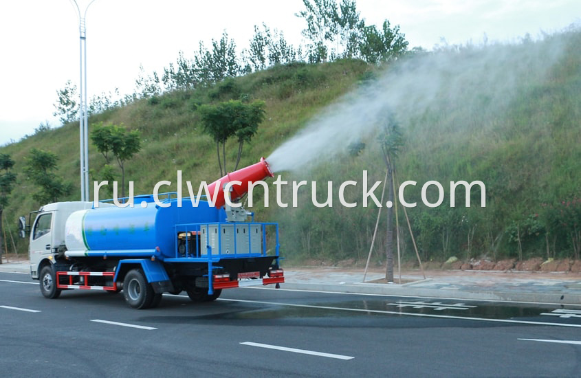 pesticide spraying truck in action 2